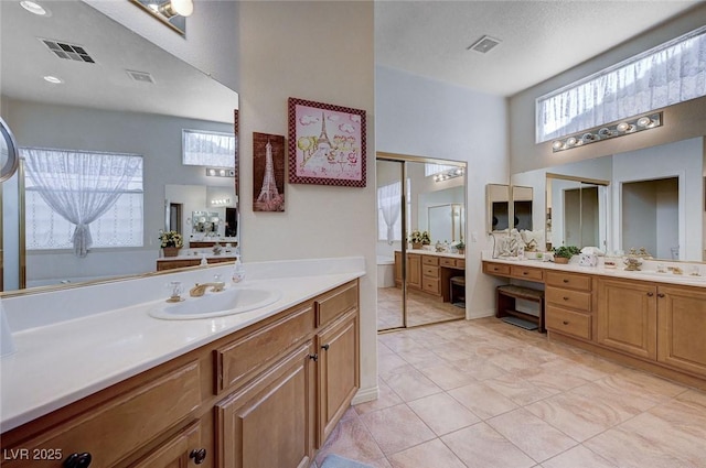 bathroom featuring vanity and tile patterned floors