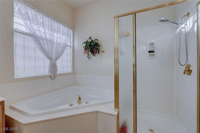 bathroom with vanity and plus walk in shower