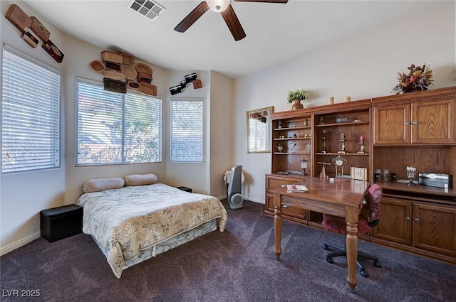 bedroom featuring ceiling fan and dark colored carpet