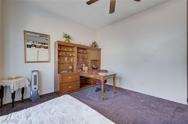 home office featuring dark colored carpet and ceiling fan