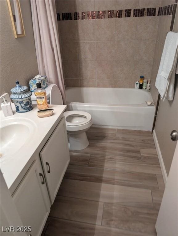 full bathroom featuring vanity, toilet, and shower / bath combo