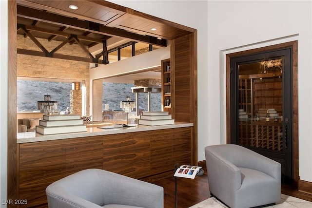 bar with vaulted ceiling with beams and wooden ceiling