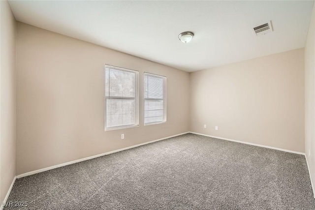 view of carpeted spare room