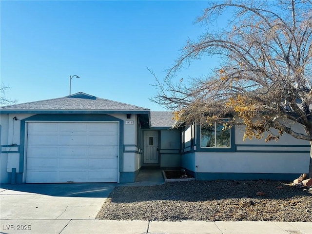 single story home featuring a garage