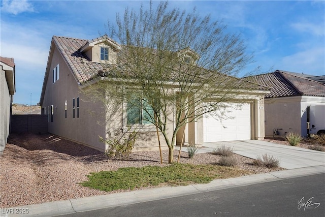 view of front of property with a garage