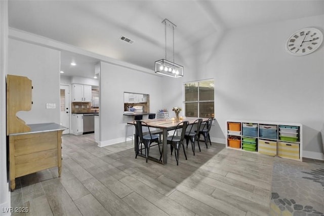 dining area with light wood-type flooring