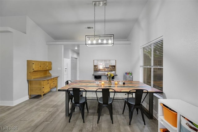 dining area with light wood-type flooring