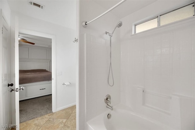 bathroom with tile patterned floors,  shower combination, and ceiling fan