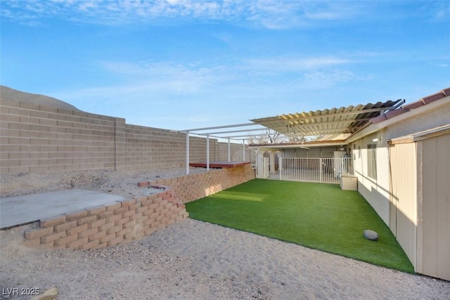 view of yard with a pergola and a patio area