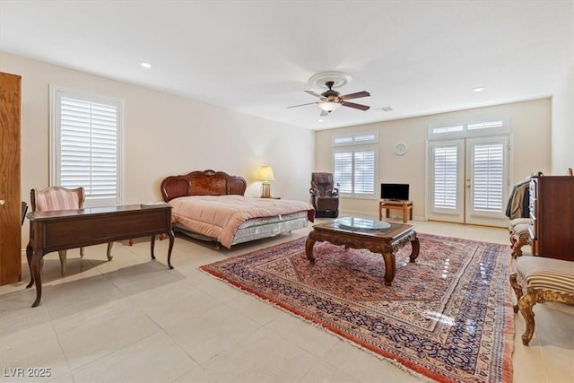 bedroom with light tile patterned flooring, ceiling fan, and french doors