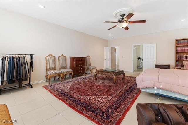 bedroom with ceiling fan and light tile patterned floors