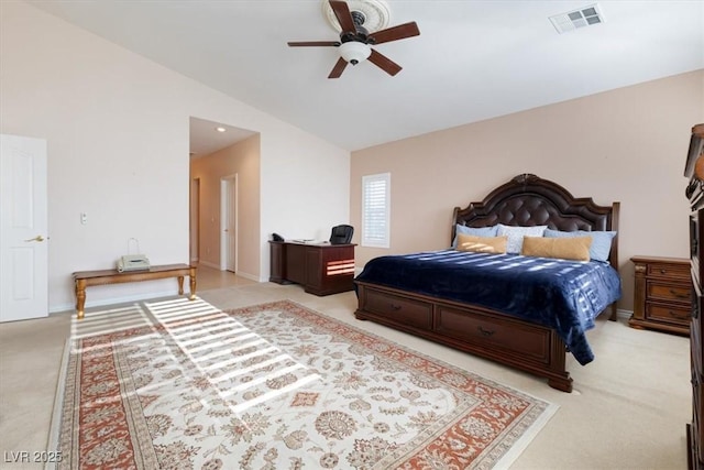 carpeted bedroom featuring lofted ceiling and ceiling fan