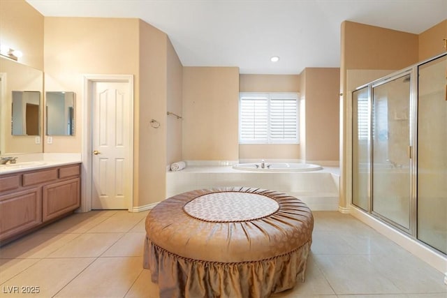 bathroom featuring vanity, tile patterned floors, and plus walk in shower