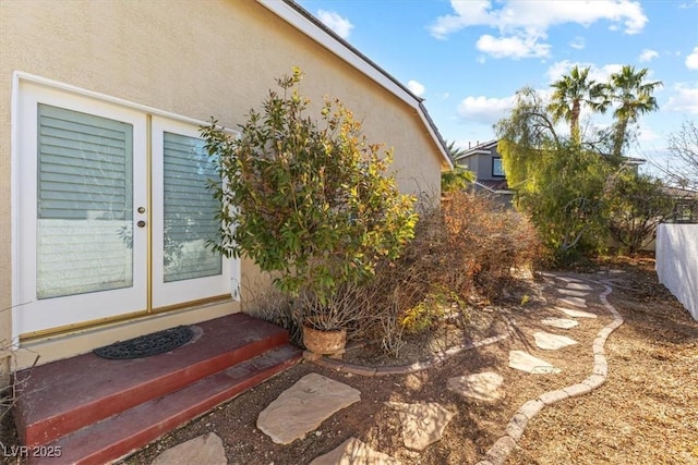 view of yard featuring french doors