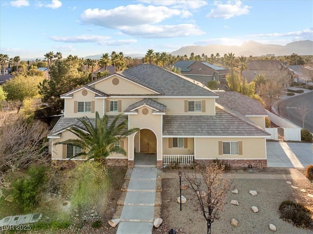 view of front of home with a mountain view