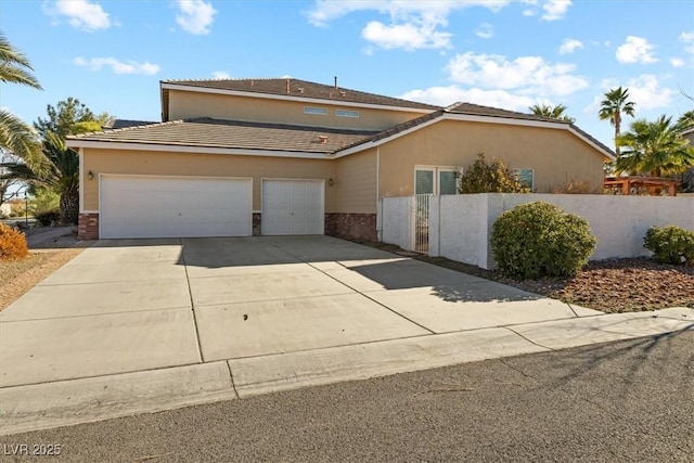 front of property with a garage