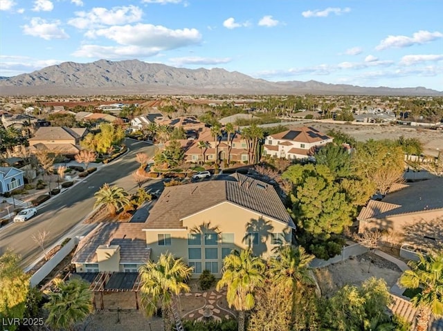 drone / aerial view featuring a mountain view