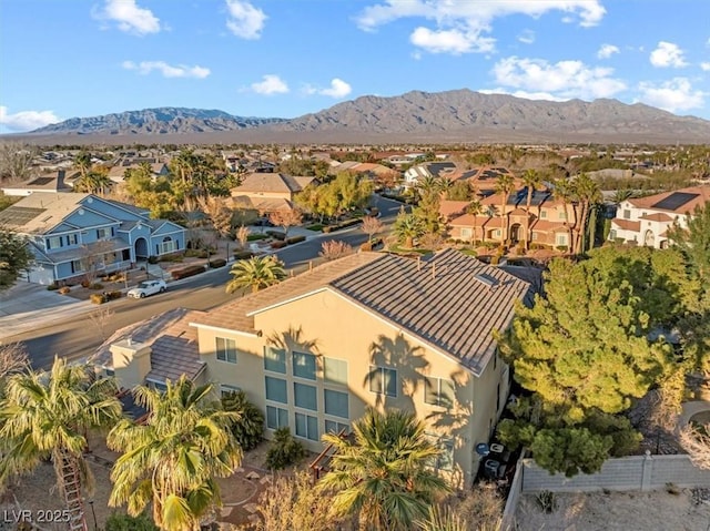 drone / aerial view featuring a mountain view