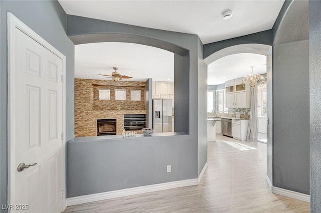 interior space featuring ceiling fan