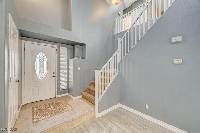 entrance foyer featuring a high ceiling