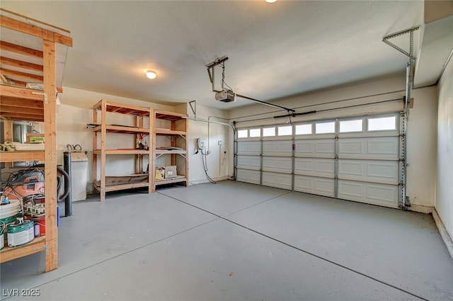 garage with washer / clothes dryer and a garage door opener