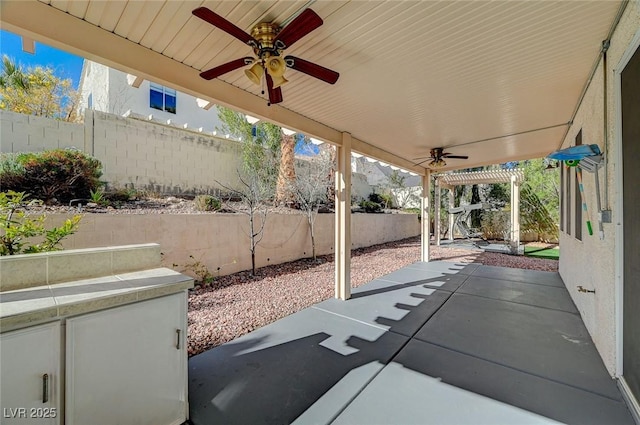 view of patio / terrace with ceiling fan