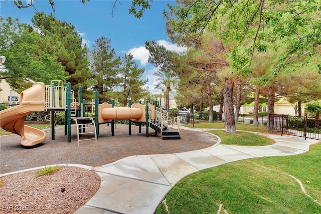 view of playground with a lawn