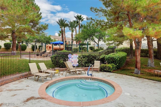 view of pool with a playground, a patio area, and a community hot tub