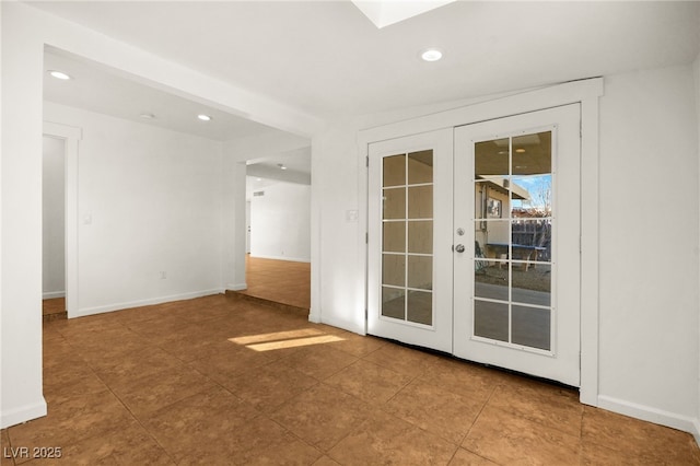 empty room featuring french doors