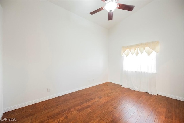 unfurnished room with ceiling fan, wood-type flooring, and vaulted ceiling