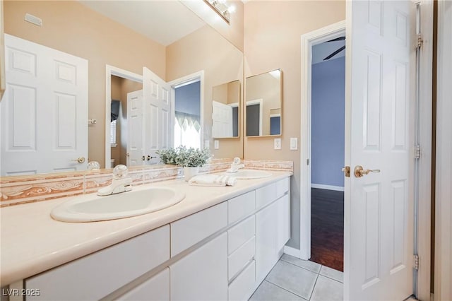 bathroom featuring tile patterned floors and vanity