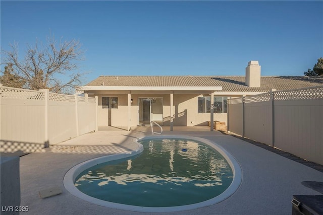 view of pool with a patio area