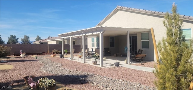 back of house with a patio area