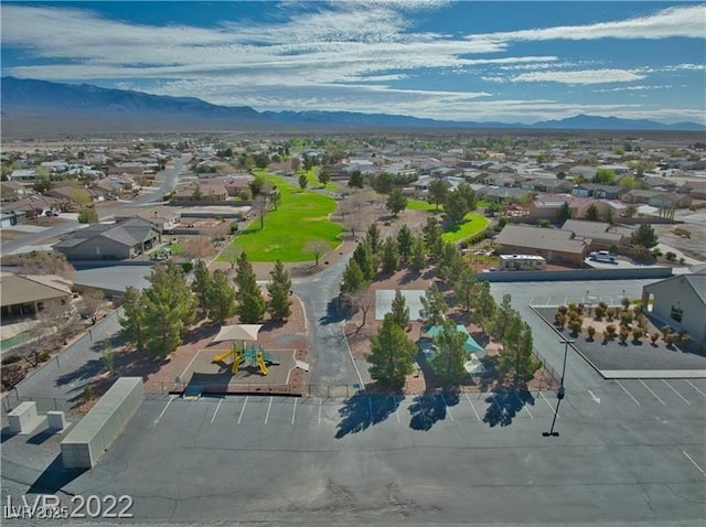 drone / aerial view featuring a mountain view