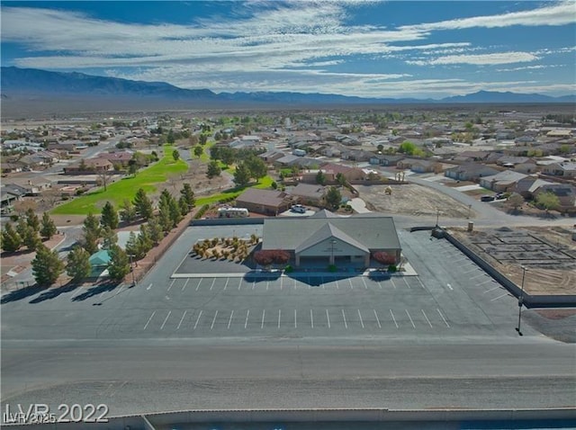 drone / aerial view featuring a mountain view