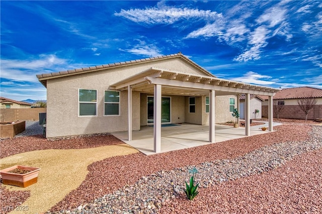 back of house with a patio and a pergola