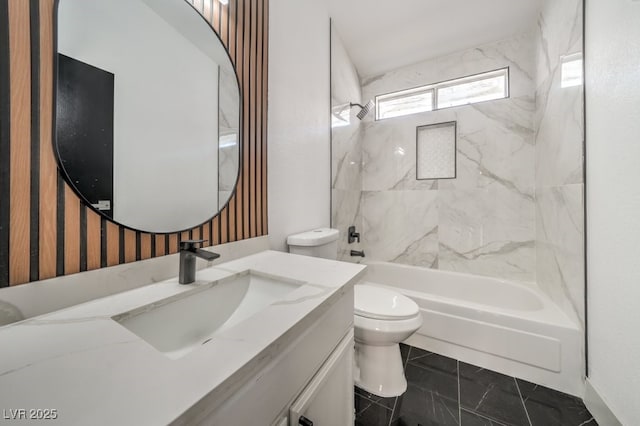 full bathroom featuring tiled shower / bath, vanity, tile patterned floors, and toilet