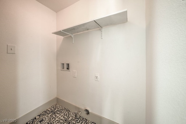 laundry room featuring tile patterned floors and hookup for a washing machine