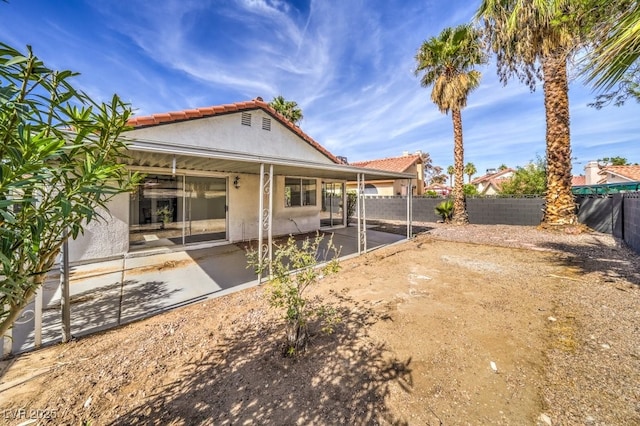 rear view of property with a patio