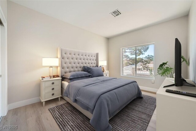 bedroom with light wood-type flooring