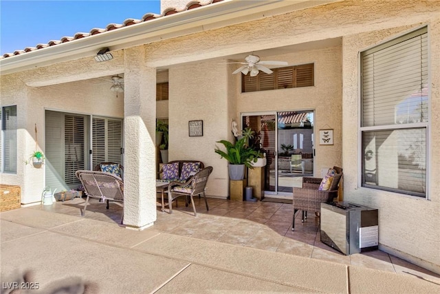 view of patio / terrace featuring ceiling fan