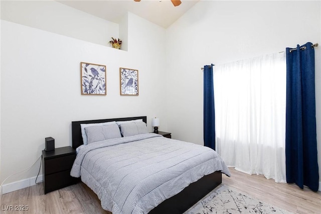 bedroom featuring ceiling fan and light hardwood / wood-style floors