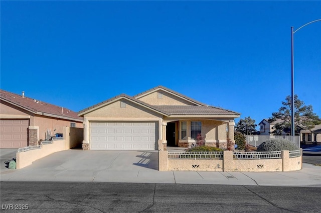 view of front of home with a garage