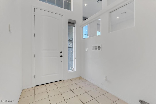 entrance foyer featuring light tile patterned floors