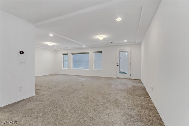 empty room featuring light colored carpet