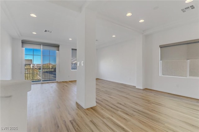 unfurnished living room featuring light hardwood / wood-style floors