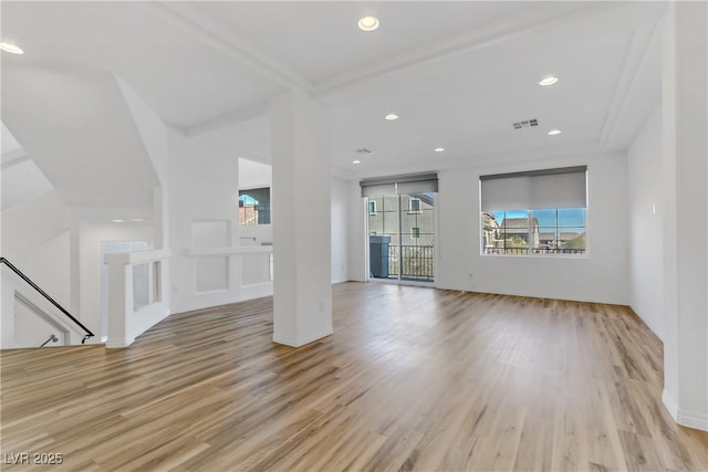 unfurnished living room featuring light hardwood / wood-style flooring