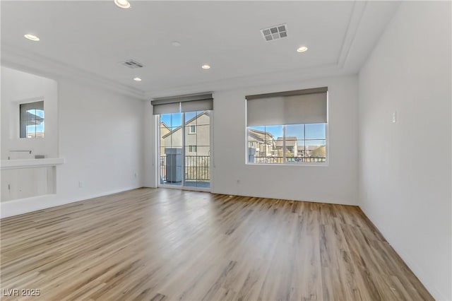 empty room with light wood-type flooring