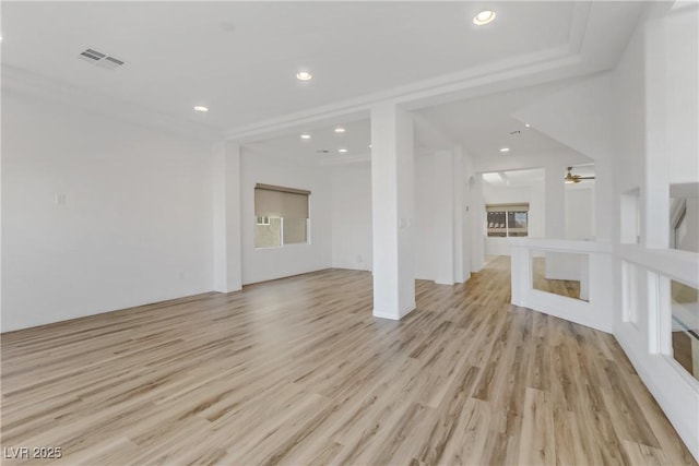 unfurnished living room featuring light hardwood / wood-style floors