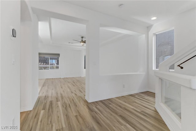 interior space featuring ceiling fan and light hardwood / wood-style flooring